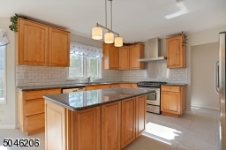 This kitchen has been nicely remodeled.  the 30" cabinets have been updated with 36".