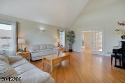 The french doors are entrances to the family room.