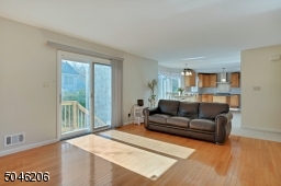 More sun!  The sliding doors give you access to the private yard and patio.