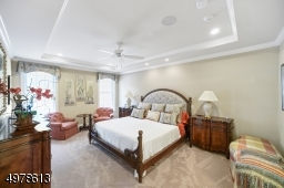 SITTING AREA, LARGE WALK IN CLOSET WITH CUSTOM BUILT IN FEATURES, MASTER BATH