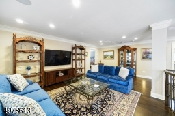 VERY OPEN, WITH VIEWS OF UPSTAIRS  ACCESS TO 2 BR'S, BATH, AND VIEW OF FOYER AND CUSTOM OFFICE WITH FRENCH DOORS ON FIRST LEVEL