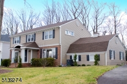 Garages behind home making the curb appeal so impressive.