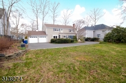 2 car garage behind home. Great size yard past the driveway area.