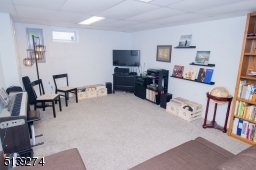 Located in Basement the spacious room you can do whatever you would like with it.