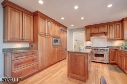 Plenty of custom cherry cabinets, Viking Stove and Viking Fridge