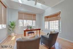 Very Bright with windows on all side and backdoor to the deck.
