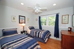 features recessed lighting, a ceiling fan light, chair rail and maple flooring