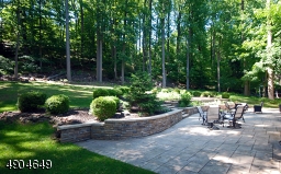 Another view which showcases the terrace, landscape and patio. Such a private oasis to sit back and enjoy natures bounty!