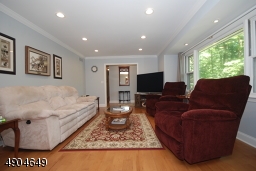 A large picture window allows the natural light to flow in but when the sun goes down, the perfectly positioned recessed lighting brightens up the room.