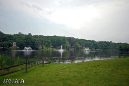 There is a walking path around the entire lake and a playground, ball field, basketball court and Tennis courts at the westerly end. A small hill makes for great sledding for all ages!