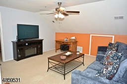 Upstairs comfortable sitting area off of MBR