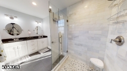 Stall Shower and Double Sink