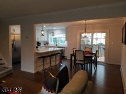 Open floor plan with sliders to deck