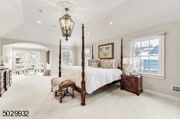 Retreat to the primary bedroom with a bright and cozy sitting area, 2 walk-in closets and en-suite bathroom.