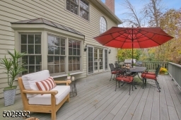 Spacious deck with gas grill hook-up for outdoor entertaining.