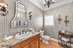 One of two first floor half bathrooms.