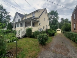 Driveway leading to detached garage