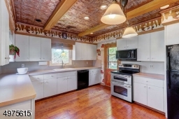 Wood/Tin Ceiling.  New Windows, Floor and Wood Floor.