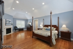 Double Door Entry, Cathedral Ceiling, Palladium Window, Sitting Area with Gas Fireplace