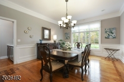 Hardwood Floors with Inlay Design, Custom Chair Rail and Wainscoting