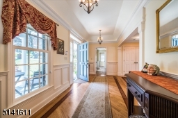 New entry foyer with cove lit ceiling