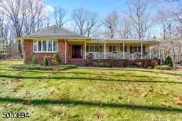 4X sided brick home with an open porch.