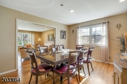 Hardwood throughout most of this home, as well as hi hat lighting.