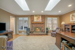 This was the family room before the 2005 great room addition.  I love the pegged flooring & skylilghts!
