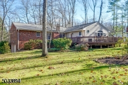 This shows the beautiful property. The deck is oversized, great for entertaining.