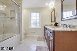 Hall Bath with Jetted Tub and Double Sinks