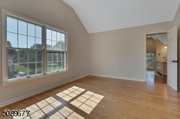 This is the fourth bedroom and connects to the a "Jack and Jill" bathroom. The lofted ceilings make this large room seem even more spacious. Don't forget the walk-in closet!