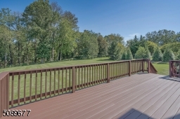 Enjoy the views of your beautiful FENCED yard. The deck is right off the kitchen and perfect to entertain large groups. The deck was just painted.