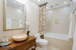 Features jetted Whirlpool tub