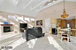 Featuring gas fireplace, wet bar, butler's pantry, wine fridge and eating area