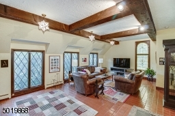 Gorgeous Stained Glass Window Adorns This Fabulous Room