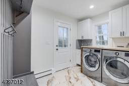 Two Laundry rooms: A fully equipped first floor laundry/mudroom and an option for a second floor laundry room. Access to large deck & backyard from the kitchen