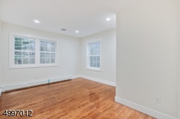 All Second-floor bedrooms have hardwood floors, new windows & new recessed lighting. All bedroom closets are designed with shelving.