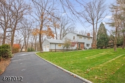 Located in a preferred New Providence neighborhood, close to top rated schools & shopping. Home set approximately on .44 acre.  Access to NYC transportation & major highways. Newly Paved Driveway.