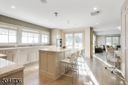 Gourmet Chef's Eat-In Kitchen is open concept to Family Room, Mud Room and Butler's Pantry