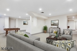 Recreation Room featuring wall-to-wall carpeting and recessed lights