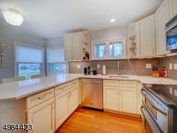 Updated Kitchen w/off white Cabinets and Stainless Appliances