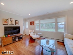 LR w/large picture window overlooking backyard