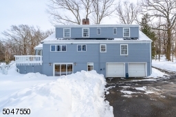 Over 1/2 acre of land. Two car garage around back. Parking for multiple cars