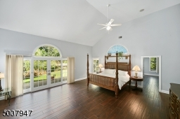 Master bedroom overlooking backyard. Lots of closet space and dressing area.