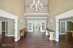 Enter through the front door and look straight through to the back of the house.
