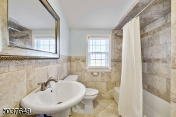 Full hall bath with shower-tub combo