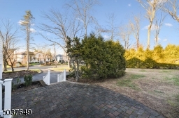 Paver Patio off of kitchen and family room with privacy plantings