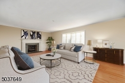 Living Room with Large Bay Window and Fireplace- Virtually Staged Furniture