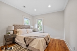 This back bedroom overlooks a lushly landscaped backyard and it has a large double closet.