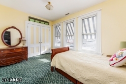 Double closet, wall to wall carpet